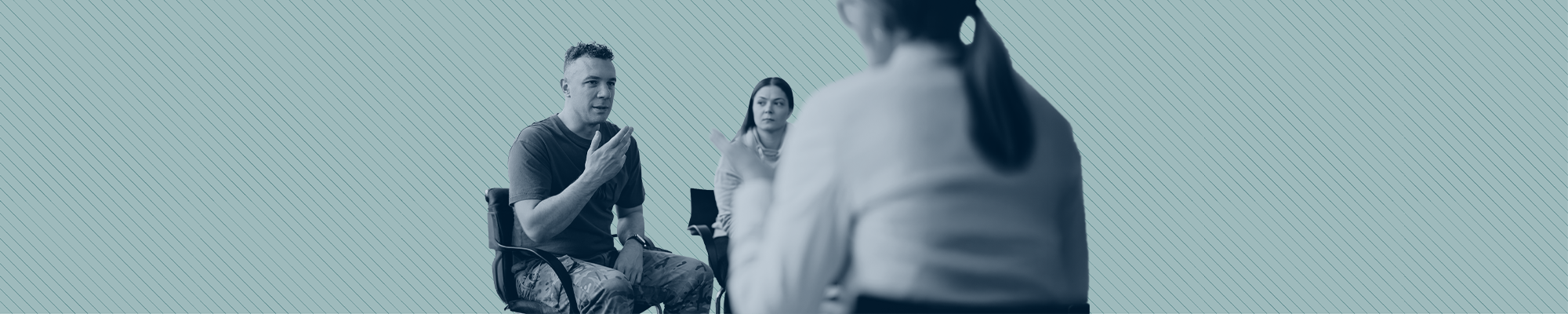 A veteran shares an experience in a group therapy session.