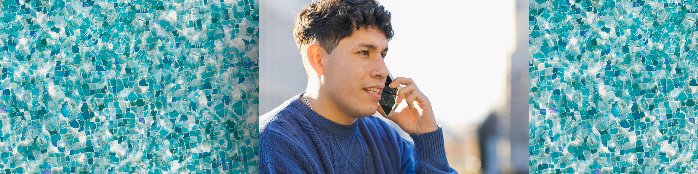 A person speaks on a mobile phone.